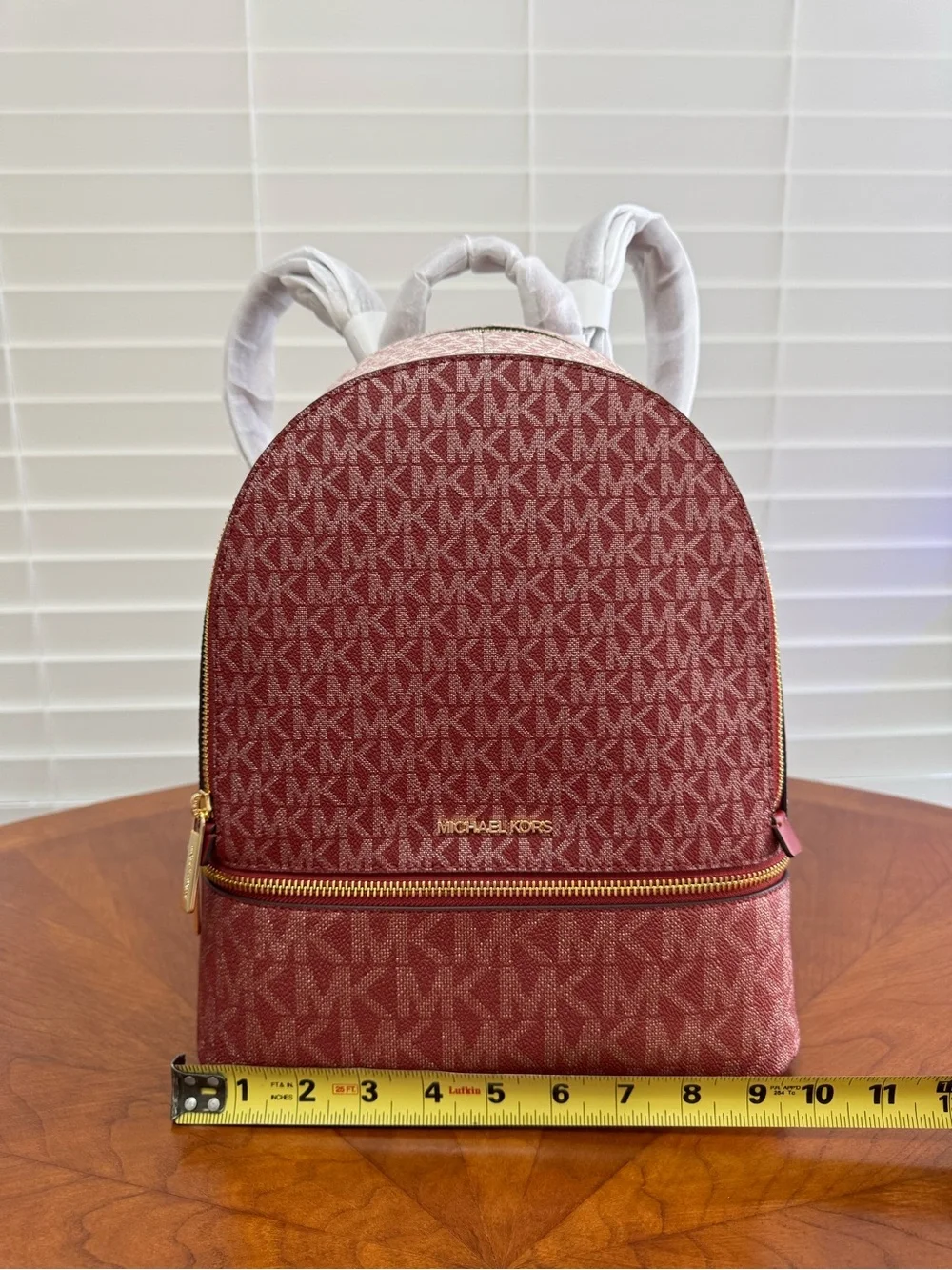 Michael Kors zipper logo
